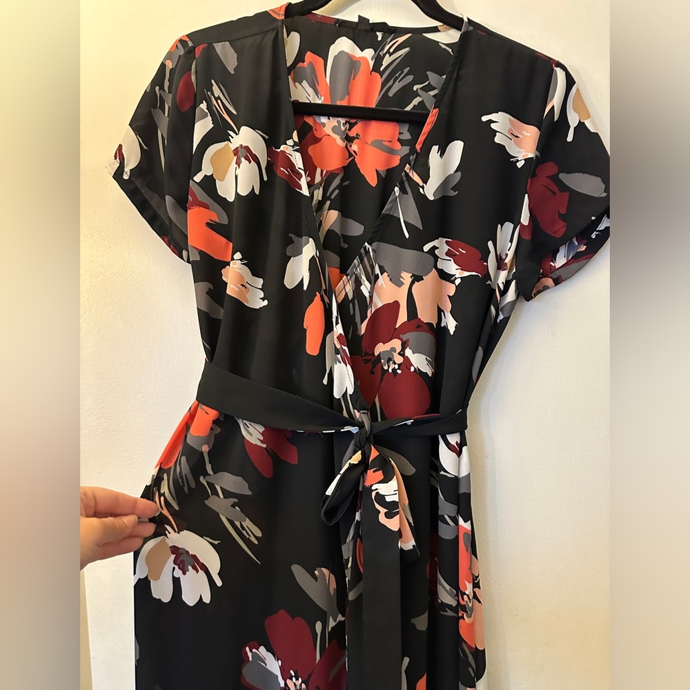 Long black and floral wrap dress